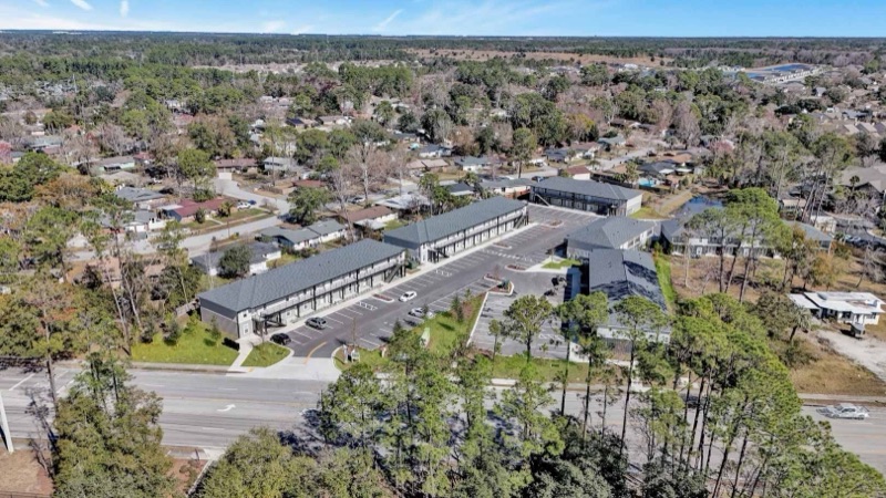 Aerial view of Huntington Forest surrounded by mature trees
