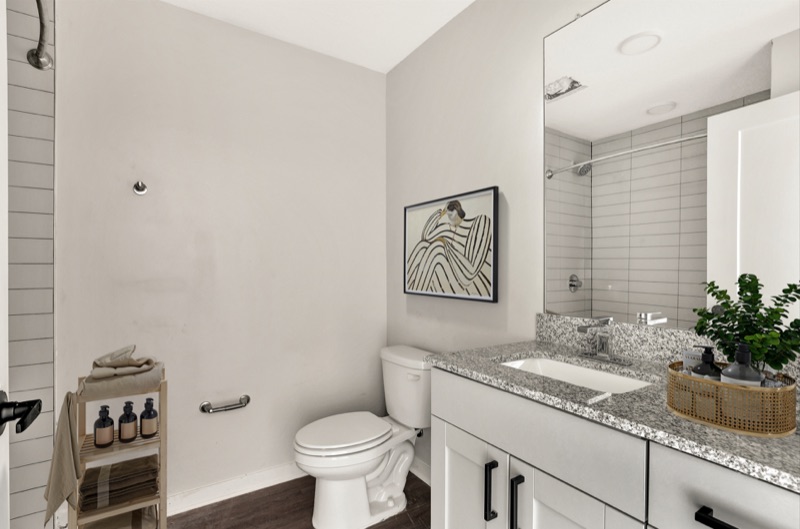Bathroom with granite vanity at Huntington Forest