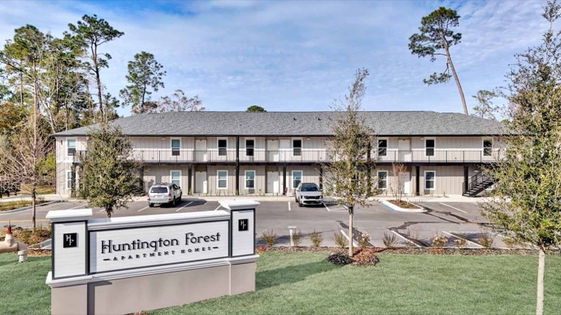 Huntington Forest entrance sign and apartment building